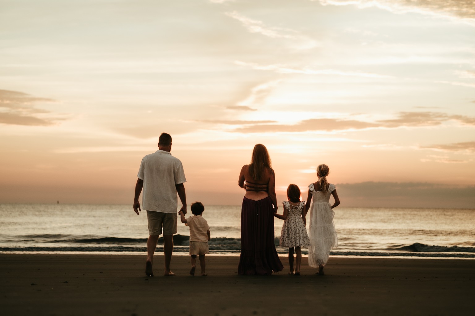 The McCormick family watching the sunset together