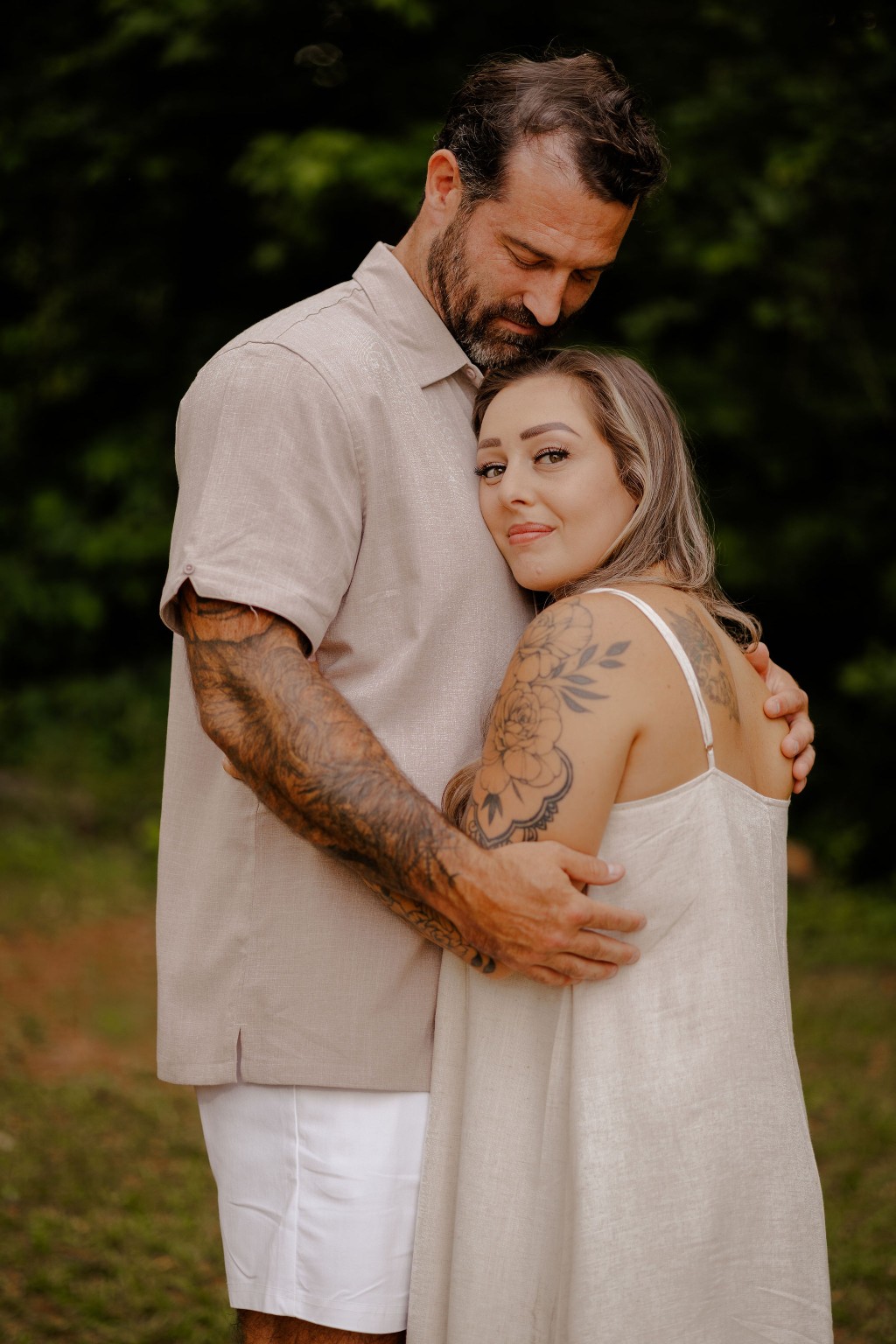 Shane and Alycea sharing a quiet embrace